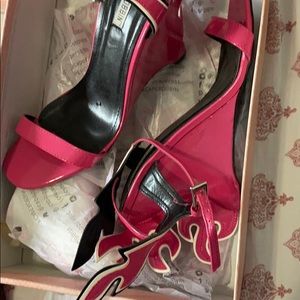 Pair of hot pink cape robbin wedge heels